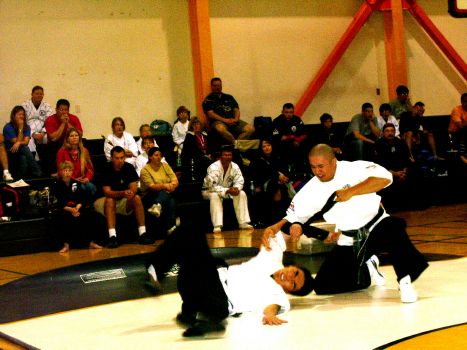 Inst. Marco Magsaysay demonstrates belt techniques